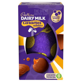 Cadbury Caramel Nibbles Egg 96g, front of the box with foil-wrapped egg visible through window