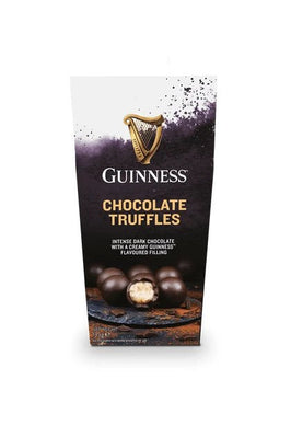 Guinness Chocolate Truffles 135g, front of the carton with truffles pictured, one halved showing filling.