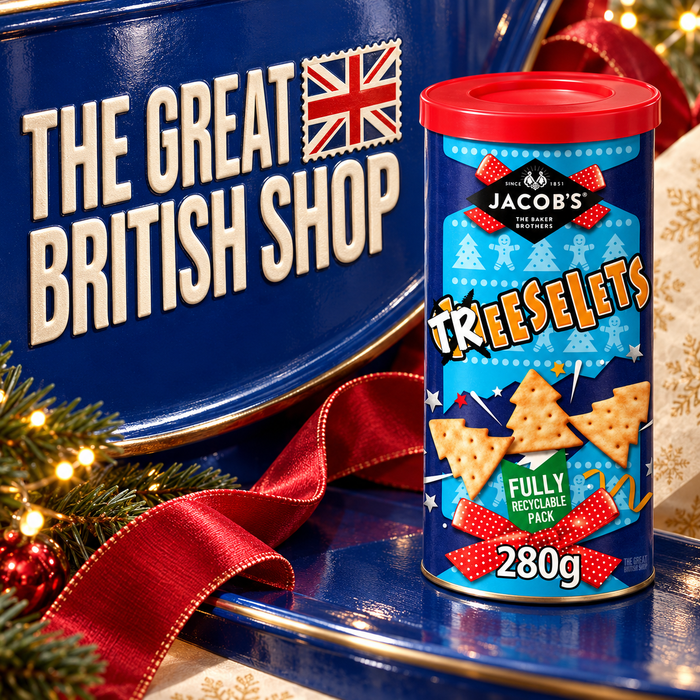 Jacob’s Treeselets280g caddy with cobalt enamel bearing The Great British Shop, red satin and festive greenery.
