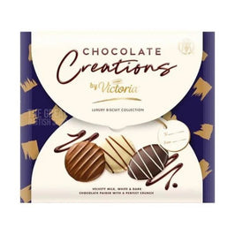 Mcvitie's Victoria Chocolate Creations 307g: front of the box showing milk, white and dark chocolate biscuits.