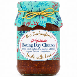 Mrs Darlington’s Boxing Day Chutney 330g jar, with a turquoise festive cover, gold bow and matching label.